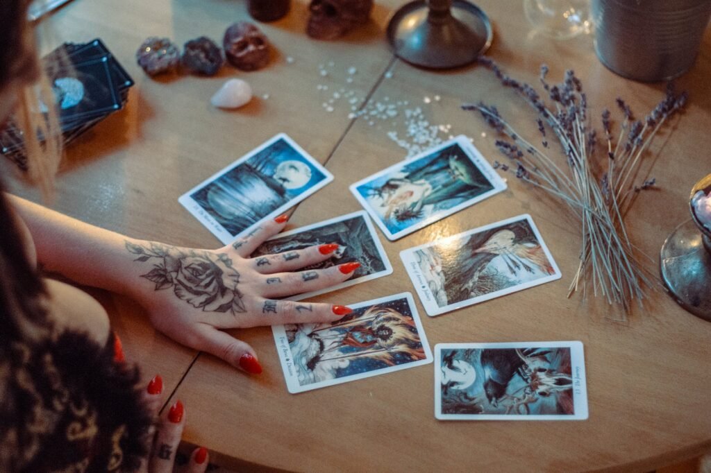 assorted tarot cards on table