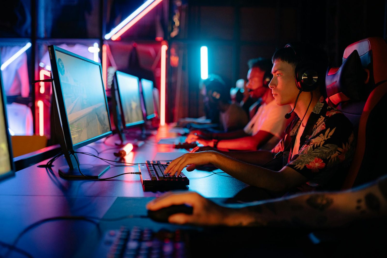 men gaming on personal computers / e-sport